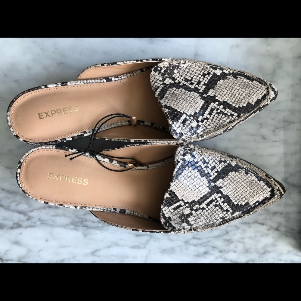 Brand new snake print mules.